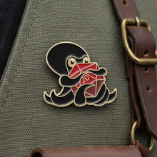 Load image into Gallery viewer, Red Squid D20 Dice Hug Pin - Dungeons & Dragons Brooch