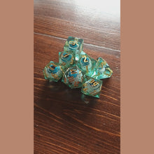 Load and play video in Gallery viewer, Eye of the Beholder Floating Eyeballs Liquid Core Dice Set
